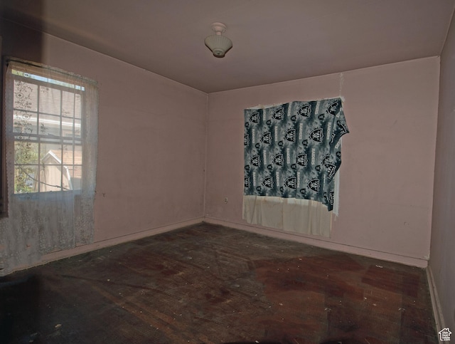 465 N 100 E, Tooele, UT 84074 - empty room featuring baseboards and wood finished floors