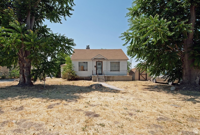 465 N 100 E, Tooele, UT 84074 - view of front of home featuring a chimney