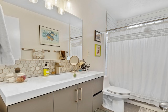 bathroom with vanity, tile patterned floors, a shower with shower curtain, decorative backsplash, and toilet
