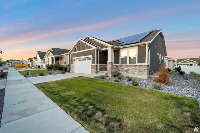 6618 N Furner Rdg, Eagle Mountain, UT 84005 - craftsman inspired home featuring a garage, a lawn, and solar panels