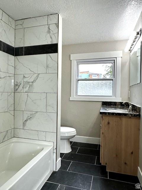3715 W 11500 N, Neola, UT 84053 - full bathroom with a textured ceiling, toilet, vanity, and tiled shower / bath combo