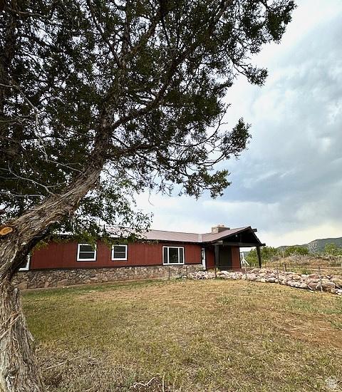 3715 W 11500 N, Neola, UT 84053 - exterior space with a front lawn