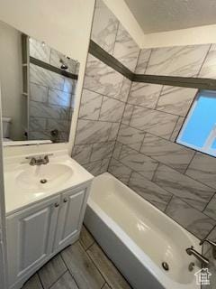 38 E 500 N, Tooele, UT 84074 - bathroom featuring shower / bathing tub combination and vanity