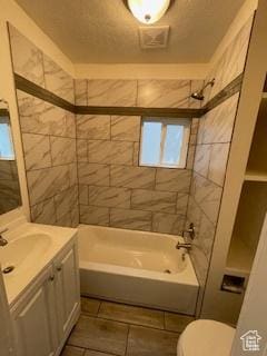 38 E 500 N, Tooele, UT 84074 - bathroom featuring toilet, vanity, and  shower combination