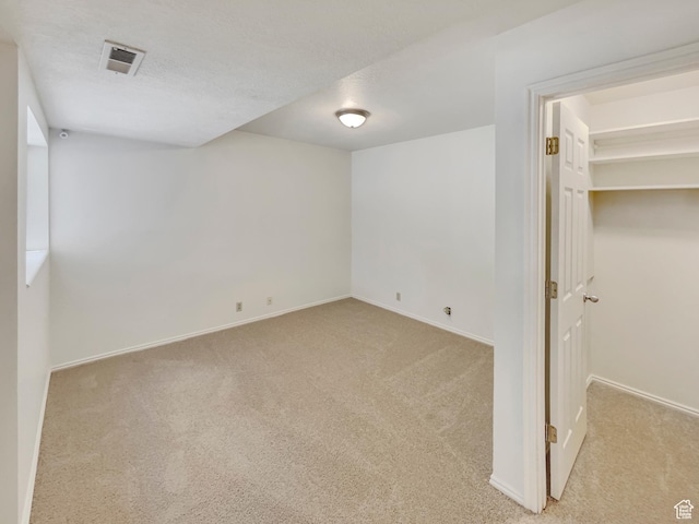 1227 Riverside Ave Unit 50, Provo, UT 84604 - carpeted spare room with a textured ceiling