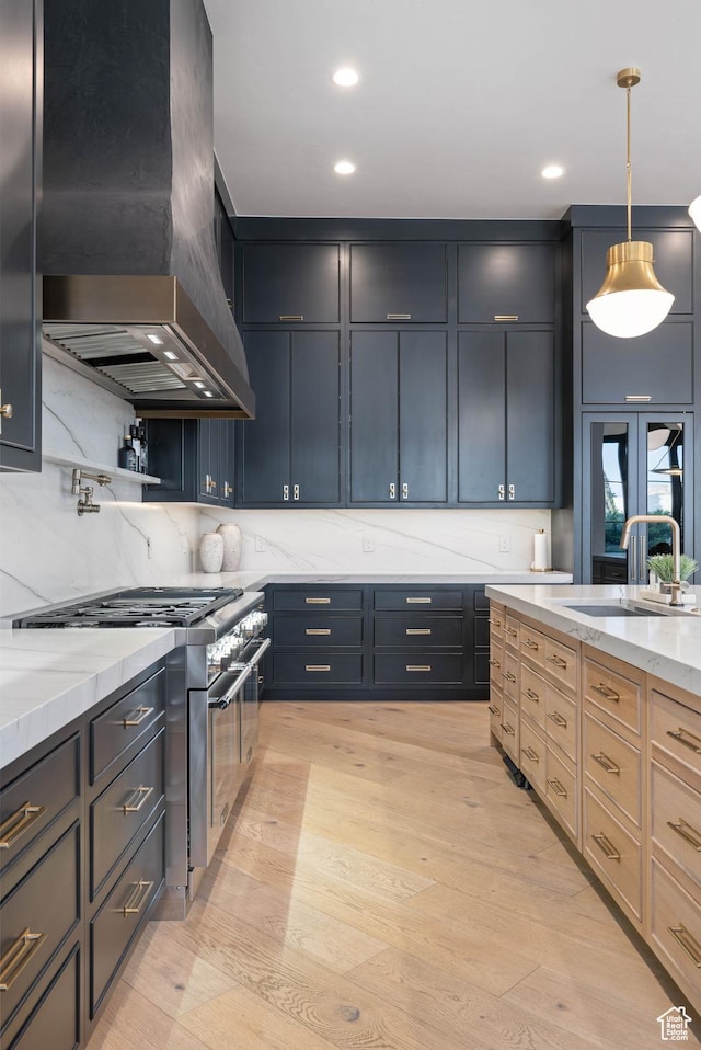 3905 S Quarry Ridge Dr, St George, UT 84790 - kitchen with sink, pendant lighting, light brown cabinets, custom range hood, and high end stainless steel range oven