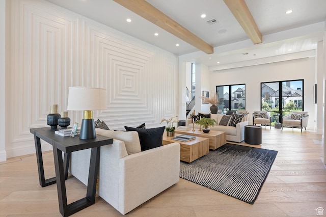 3905 S Quarry Ridge Dr, St George, UT 84790 - living room featuring light hardwood / wood-style flooring and beamed ceiling