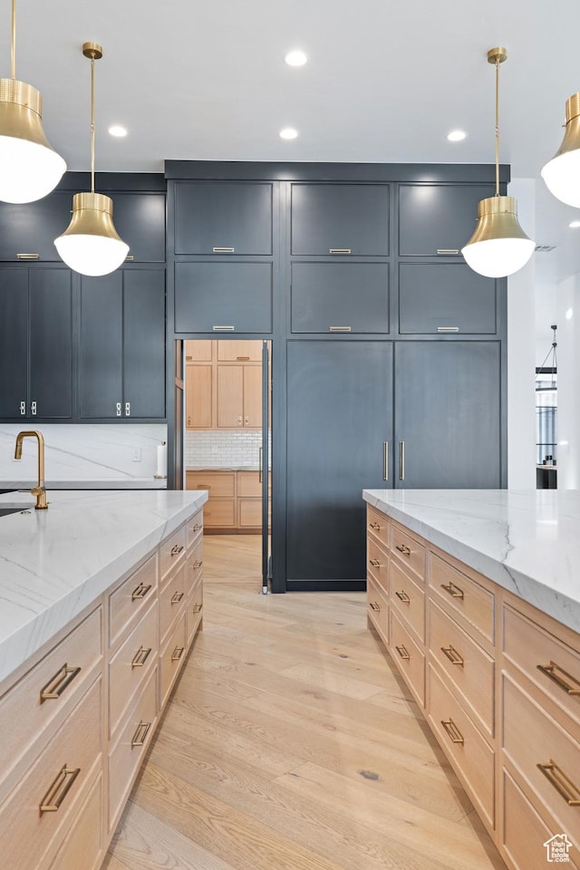 3905 S Quarry Ridge Dr, St George, UT 84790 - kitchen featuring gray cabinetry, hanging light fixtures, and light brown cabinets