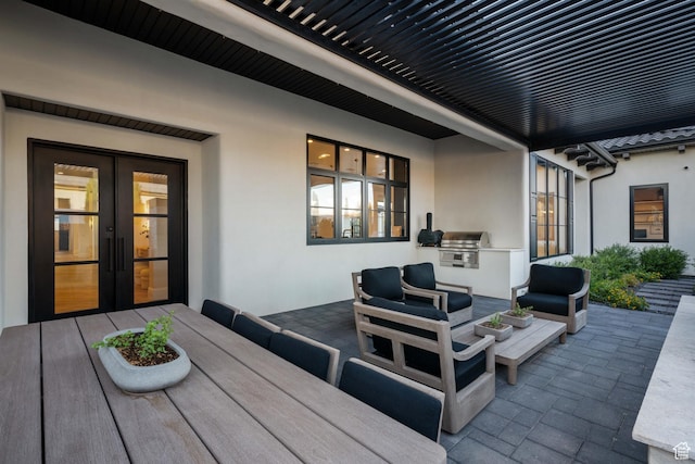 3905 S Quarry Ridge Dr, St George, UT 84790 - view of patio featuring a grill, an outdoor hangout area, french doors, and an outdoor kitchen