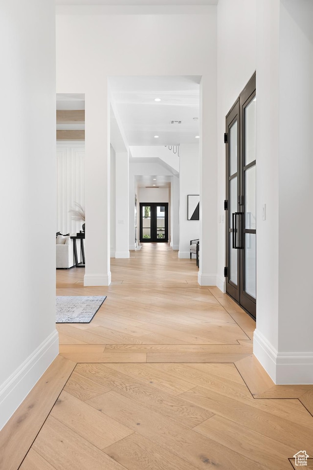 3905 S Quarry Ridge Dr, St George, UT 84790 - hallway with light hardwood / wood-style floors and french doors