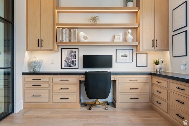 3905 S Quarry Ridge Dr, St George, UT 84790 - office area featuring built in desk and light hardwood / wood-style floors