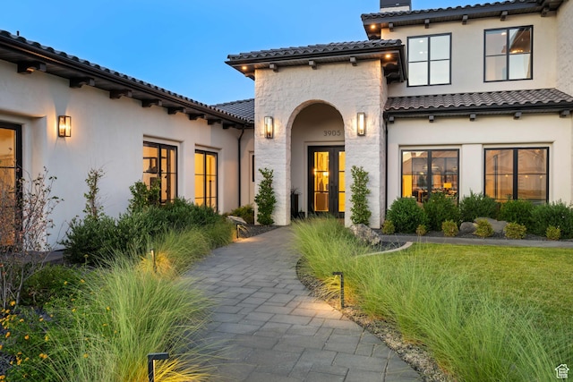 3905 S Quarry Ridge Dr, St George, UT 84790 - view of exterior entry with a lawn