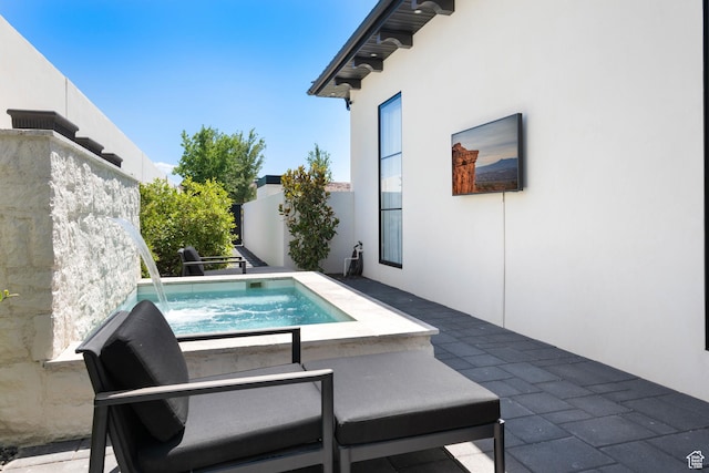 3905 S Quarry Ridge Dr, St George, UT 84790 - view of swimming pool featuring an outdoor hot tub and a patio area