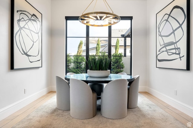 3905 S Quarry Ridge Dr, St George, UT 84790 - dining area featuring a notable chandelier and hardwood / wood-style flooring