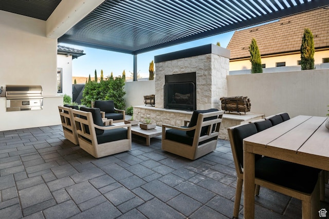 3905 S Quarry Ridge Dr, St George, UT 84790 - view of patio featuring grilling area, an outdoor living space with a fireplace, and area for grilling