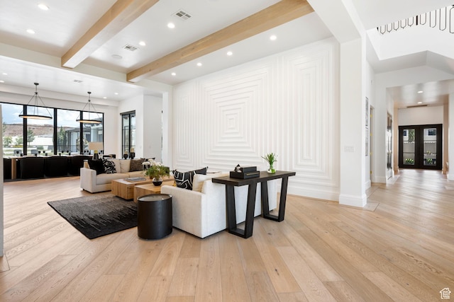 3905 S Quarry Ridge Dr, St George, UT 84790 - living room featuring french doors, beamed ceiling, and light wood-type flooring