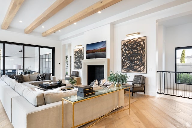 3905 S Quarry Ridge Dr, St George, UT 84790 - living room featuring beamed ceiling and light hardwood / wood-style floors