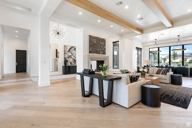 3905 S Quarry Ridge Dr, St George, UT 84790 - living room featuring an inviting chandelier, light hardwood / wood-style flooring, and beamed ceiling