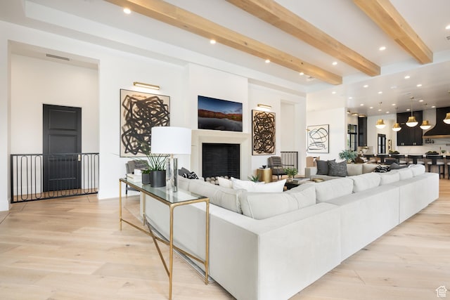 3905 S Quarry Ridge Dr, St George, UT 84790 - living room with beam ceiling and light hardwood / wood-style floors