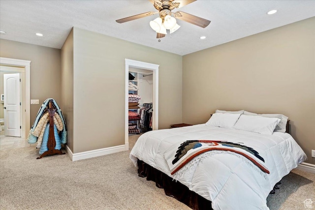 898 E 260 N, Hyde Park, UT 84318 - carpeted bedroom featuring a walk in closet, ceiling fan, and a closet