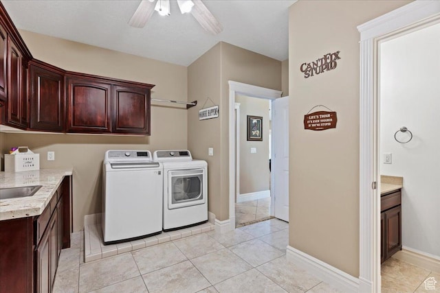 898 E 260 N, Hyde Park, UT 84318 - laundry area featuring cabinets, ceiling fan, sink, light tile patterned floors, and washing machine and clothes dryer