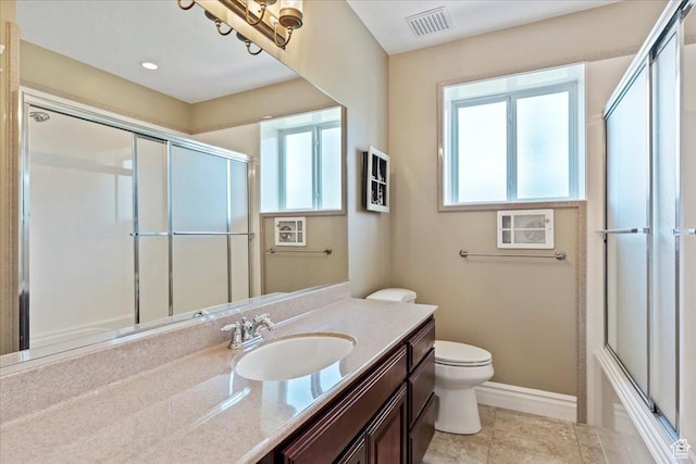898 E 260 N, Hyde Park, UT 84318 - full bathroom featuring vanity, toilet, and enclosed tub / shower combo