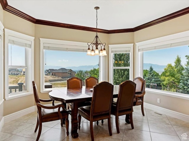 898 E 260 N, Hyde Park, UT 84318 - tiled dining room with a mountain view, crown molding, and an inviting chandelier