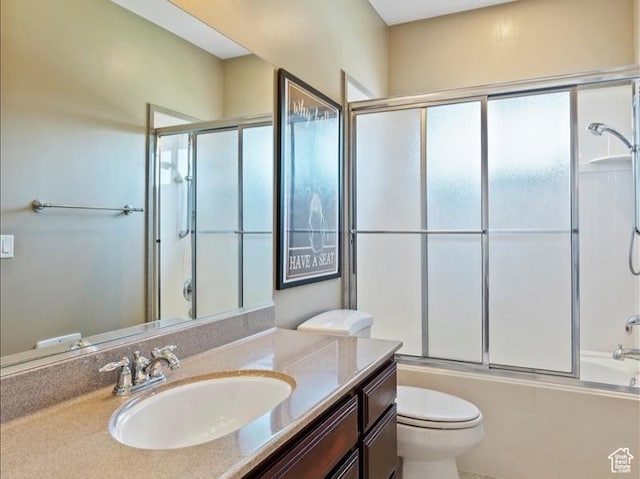 898 E 260 N, Hyde Park, UT 84318 - full bathroom featuring shower / bath combination with glass door, vanity, and toilet