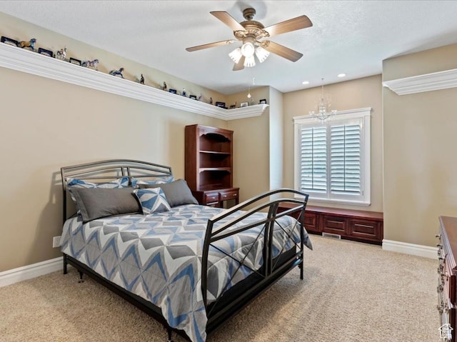 898 E 260 N, Hyde Park, UT 84318 - bedroom featuring light carpet and ceiling fan with notable chandelier