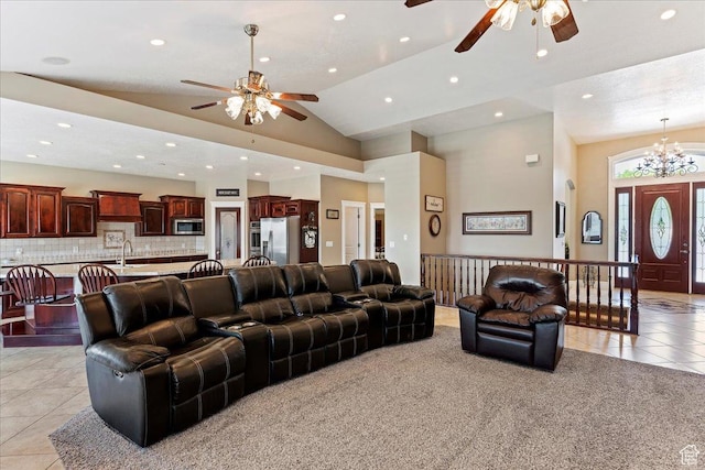 898 E 260 N, Hyde Park, UT 84318 - tiled living room with ceiling fan with notable chandelier, sink, and vaulted ceiling
