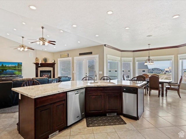 898 E 260 N, Hyde Park, UT 84318 - kitchen featuring ceiling fan, dishwasher, an island with sink, pendant lighting, and dark brown cabinets