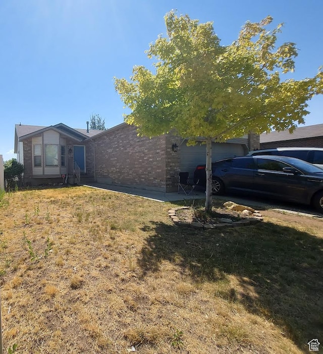 8497 S 6465 W, West Jordan, UT 84081 - view of property exterior featuring a yard