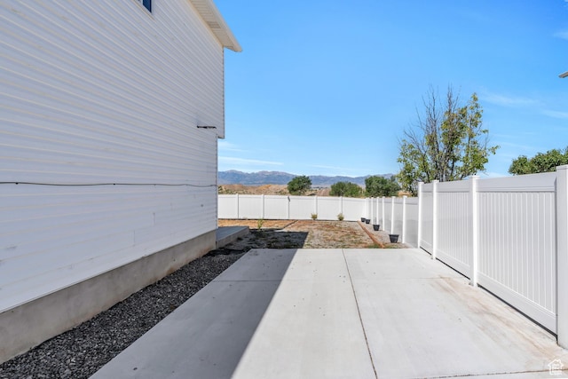 view of patio featuring a mountain view
