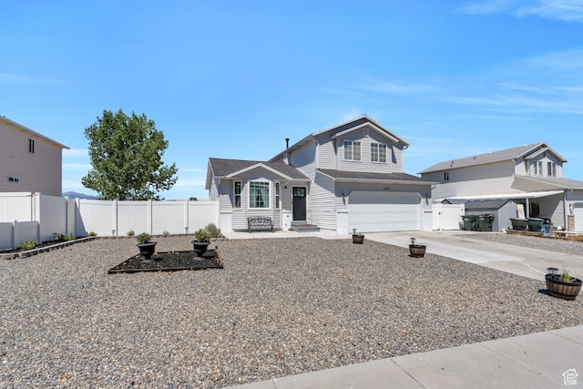 front of property with a garage