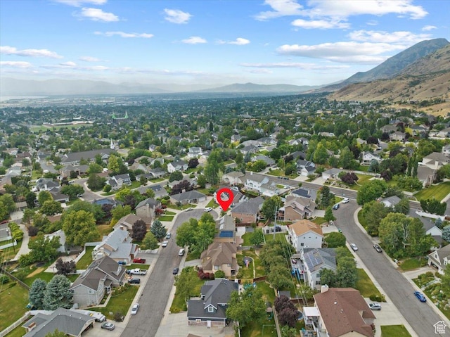 aerial view featuring a mountain view and a residential view