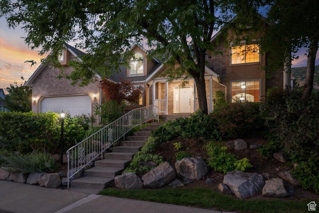 traditional home featuring brick siding