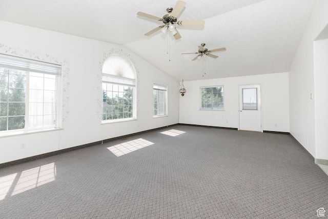 596 Eagle Dr, Preston, ID 83263 - carpeted spare room with ceiling fan and lofted ceiling