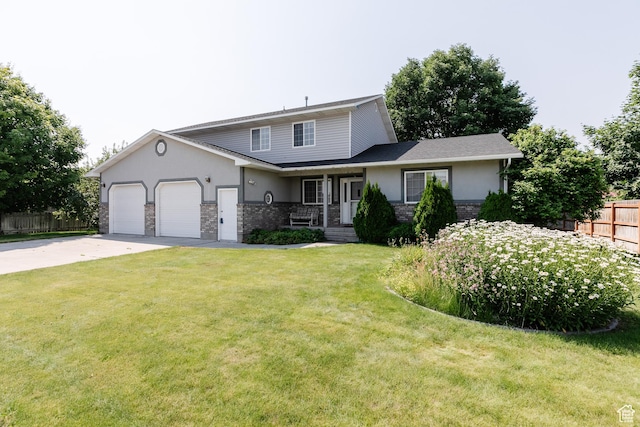 596 Eagle Dr, Preston, ID 83263 - view of front property featuring a garage and a front lawn