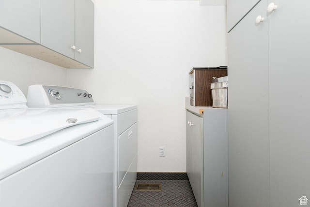 596 Eagle Dr, Preston, ID 83263 - laundry area with cabinets, tile patterned flooring, and independent washer and dryer