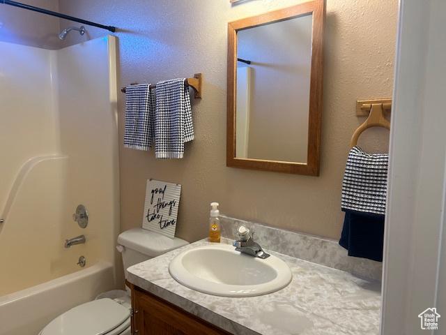 596 Eagle Dr, Preston, ID 83263 - full bathroom featuring  shower combination, toilet, and vanity