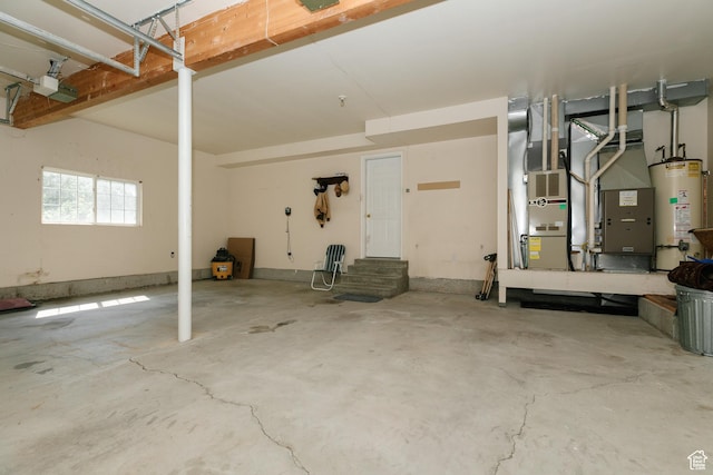 596 Eagle Dr, Preston, ID 83263 - garage featuring a garage door opener and water heater