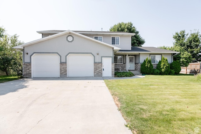 596 Eagle Dr, Preston, ID 83263 - view of property with a garage and a front lawn