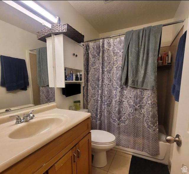 246 E Helm Ave S Unit 26, South Salt Lake, UT 84115 - full bathroom with tile patterned flooring, toilet, vanity, and shower / bath combo