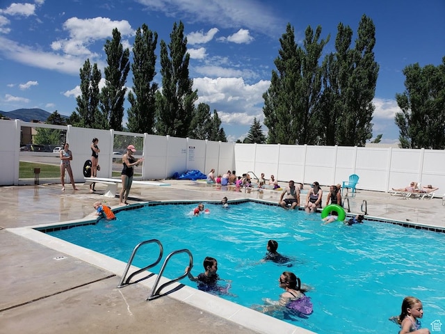 2176 S Bear Lake Blvd S Unit 452, Garden City, UT 84028 - view of pool with a fenced in pool, fence, and a patio