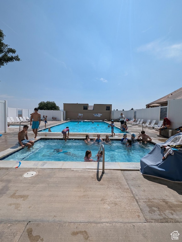 2176 S Bear Lake Blvd S Unit 452, Garden City, UT 84028 - community pool with a patio area and fence