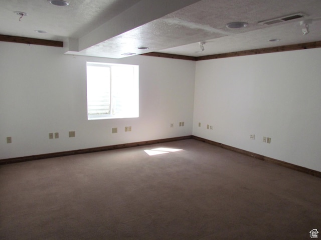 6528 S Rogers Dr, West Valley City, UT 84118 - spare room featuring a textured ceiling and carpet