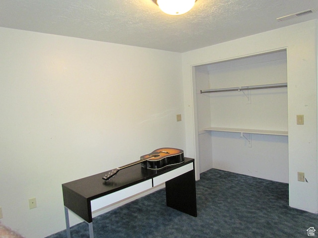 6528 S Rogers Dr, West Valley City, UT 84118 - office area with a textured ceiling and dark carpet