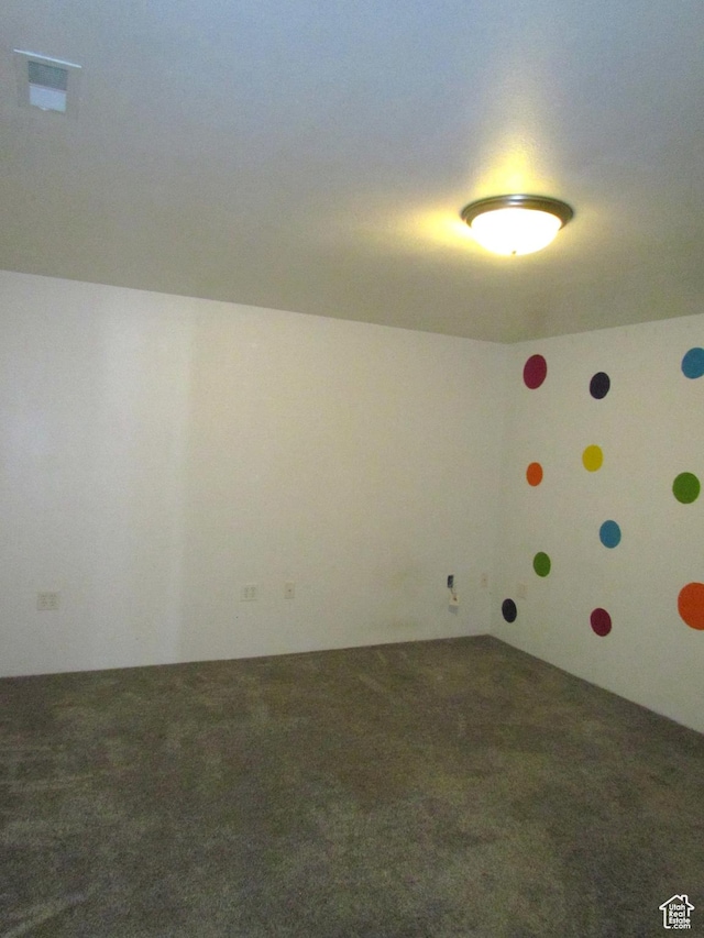 6528 S Rogers Dr, West Valley City, UT 84118 - unfurnished room featuring dark colored carpet