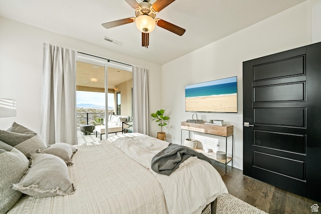 6026 S Zen Trail Way, St George, UT 84790 - bedroom with ceiling fan, access to exterior, and dark hardwood / wood-style flooring