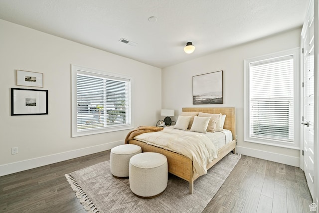 6026 S Zen Trail Way, St George, UT 84790 - bedroom with dark wood-type flooring